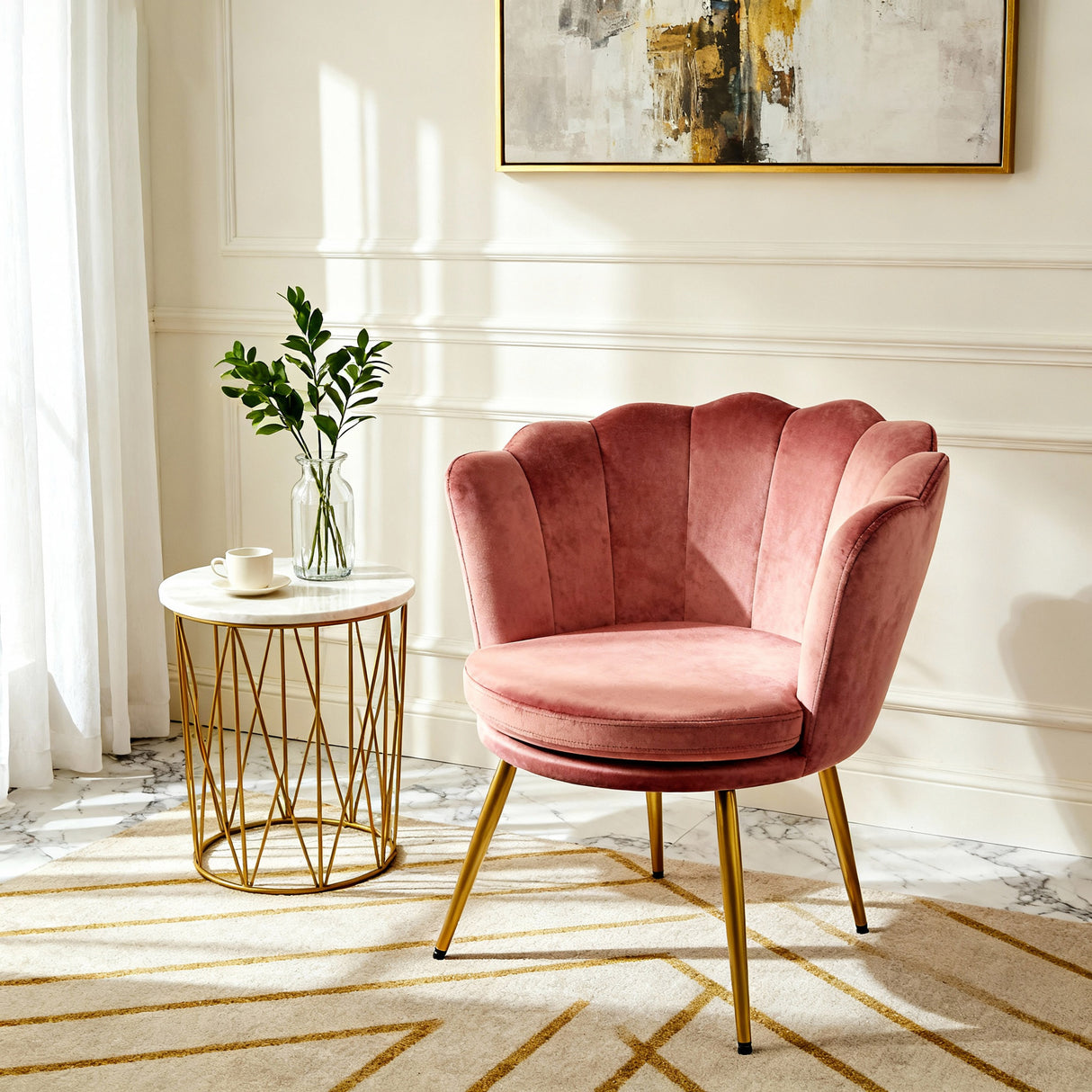 Pink velvet armchair in a stylish room with a side table and abstract art.