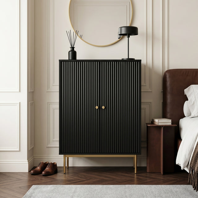 Black Devon Highboard Storage Cabinet with Doors styled with decorative accessories in a modern hallway.