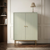 Sage Devon Highboard Storage Cabinet with Doors styled with decorative accessories in a modern hallway.