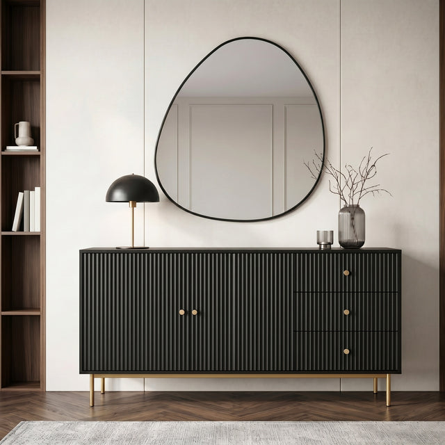 Black Devon Large Sideboard Cabinet with Storage styled with decorative accessories and a round mirror.