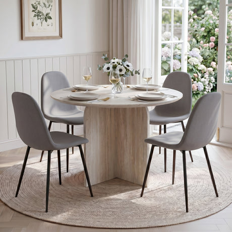 NYX Dining Set – 4-Seater Round Stone-Effect Table with Linen Chairs