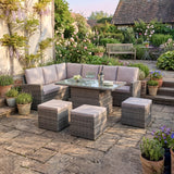 Outdoor patio set with furniture and plants in a garden setting