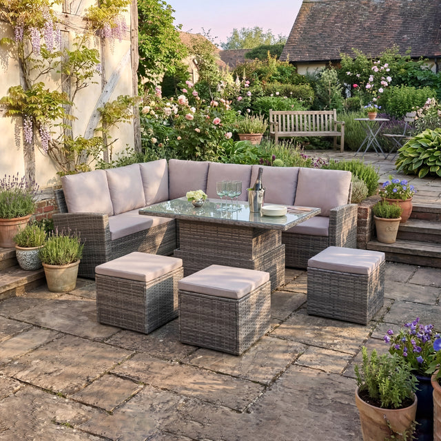 Outdoor patio set with furniture and plants in a garden setting
